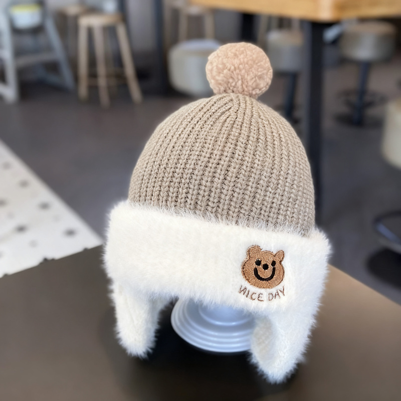 Children's hat with ear flaps, knitted, warm
