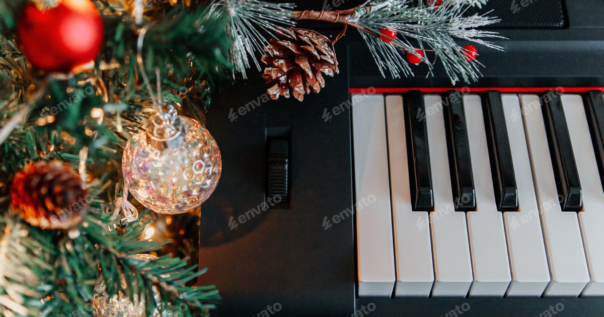 Festive Piano Decorated with Christmas Ornaments and Pinecones Free Download – Envato Elements