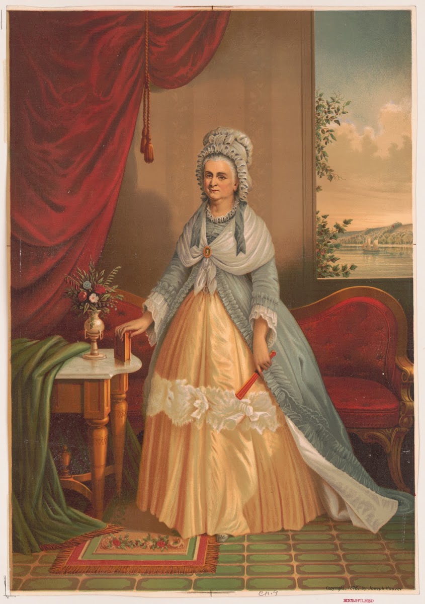 Portrait of woman holding fan and book standing in front of couch 1876