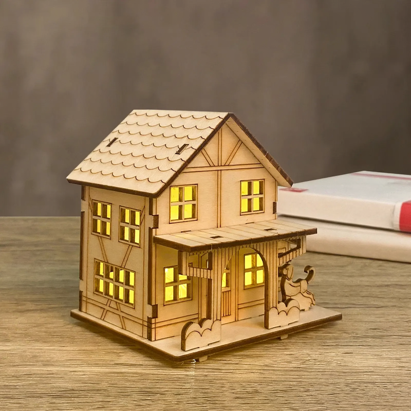 DIY Christmas house made of lime wood with lighting