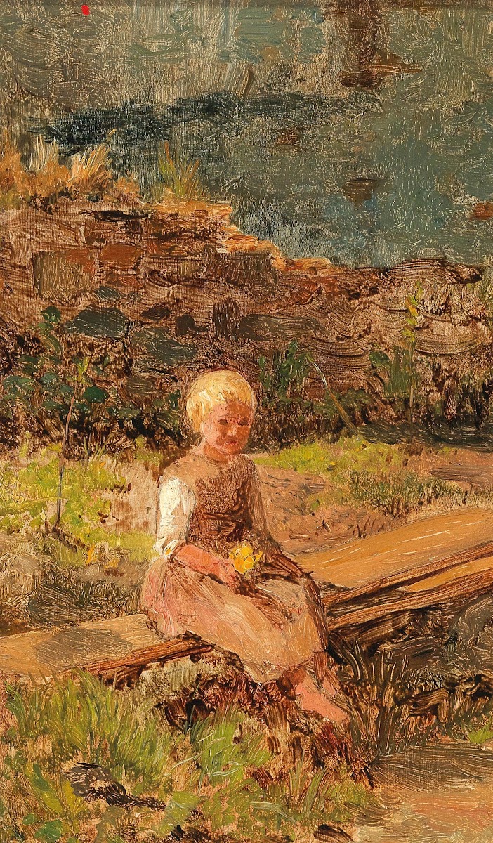 Child Sitting on a Wooden Walkway