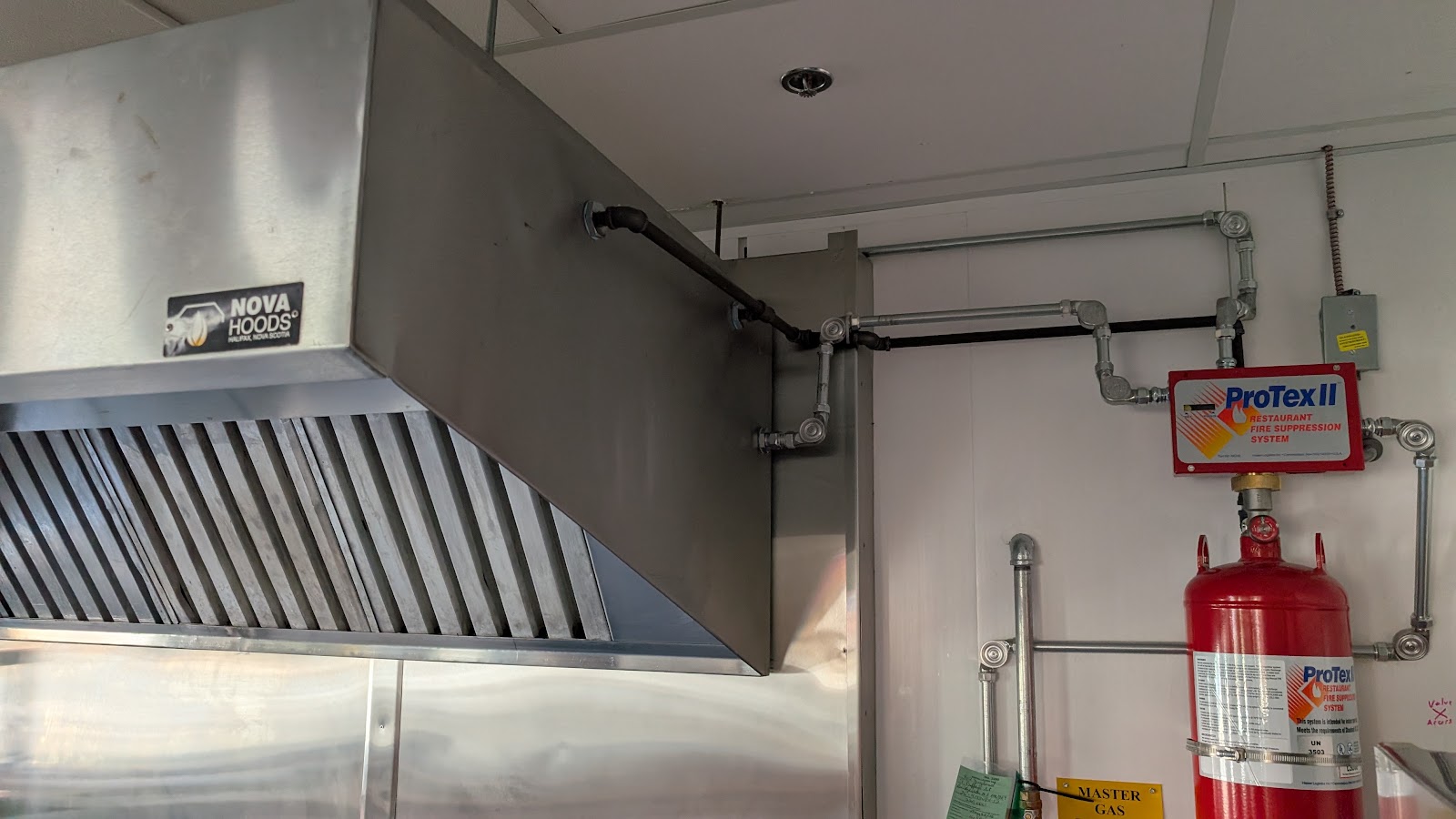 Kitchen hood and fire suppression