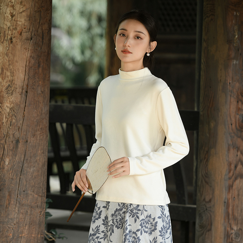 Warm knitted sweater with high collar