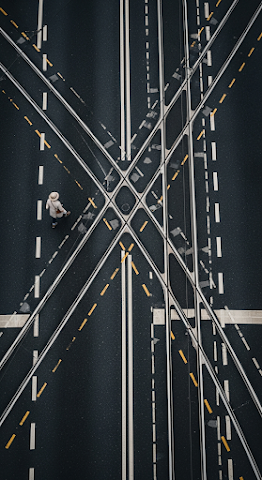 Pedestrian on Wet Tracks