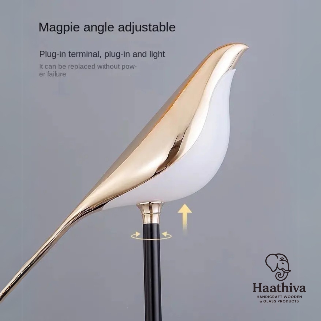 Close‑up of golden bird heads and acrylic body