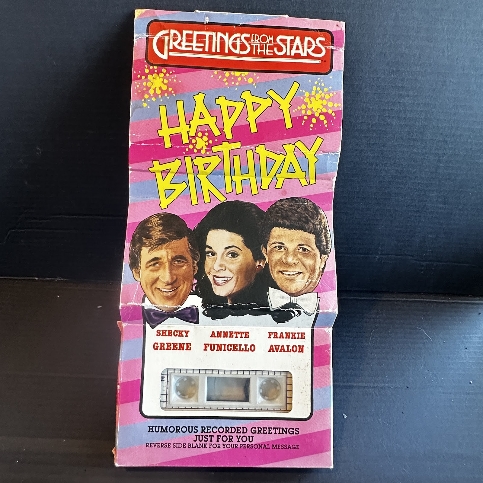 Microcassette greeting card titled Greetings From The Stars featuring Annette Funicello, Frankie Avalon, and Shecky Greene, circa early 1980s