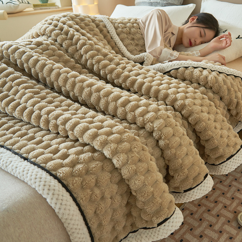 Soft coral fleece blanket with lamb fleece appearance