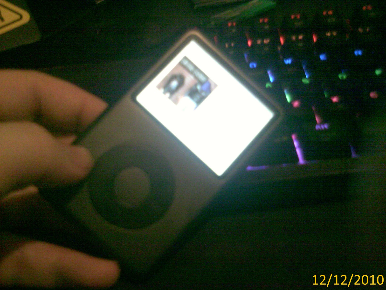 An iPod playing Crystal Castles