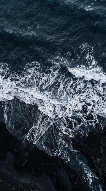 Aerial Drone Photography of Dark Blue Sea and Foaming White Waves - Free mobile Wallpaper
