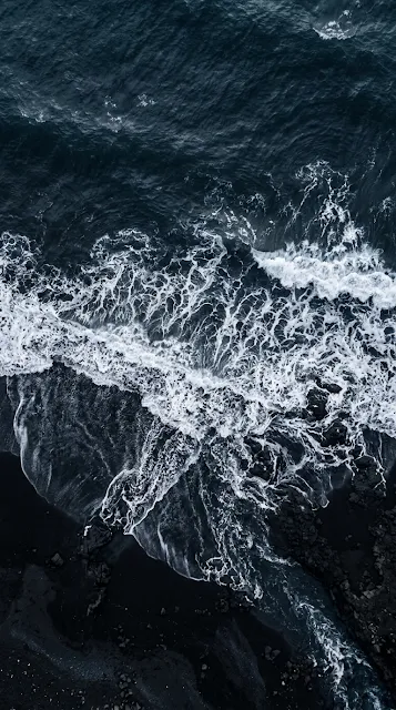 Aerial Drone Photography of Dark Blue Sea and Foaming White Waves