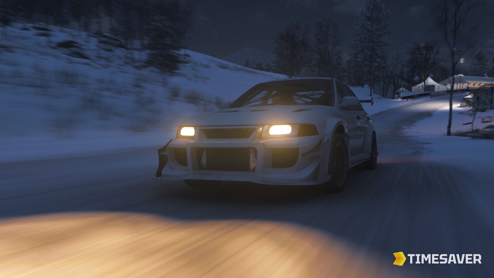 A tuned car at speed on a snowy Japanese mountain road at night in Forza Horizon 6