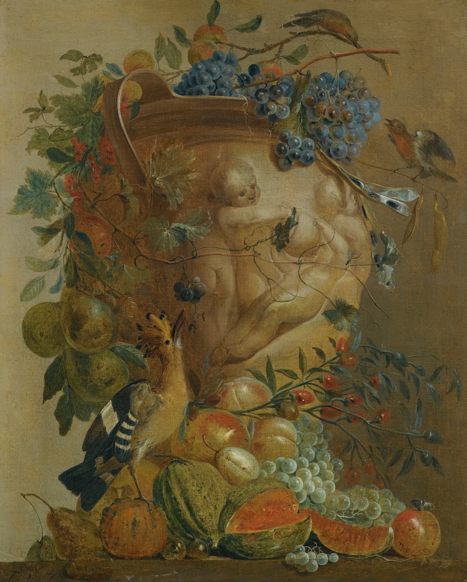 A Still Life Of Melons Grapes Peaches And Other Fruits In A Stone Urn With Birds