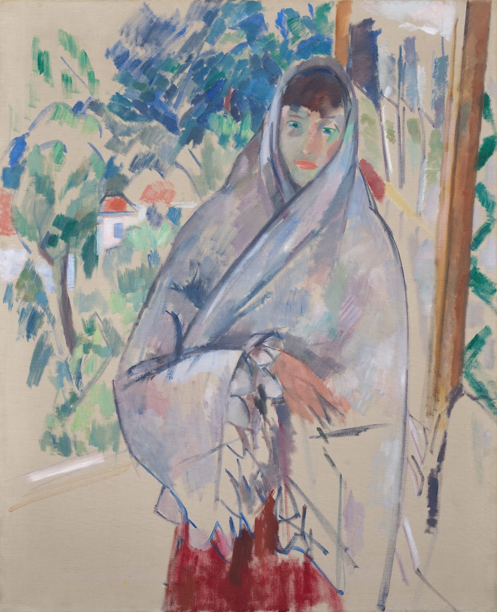 Woman standing in front of the window white shawl 1914