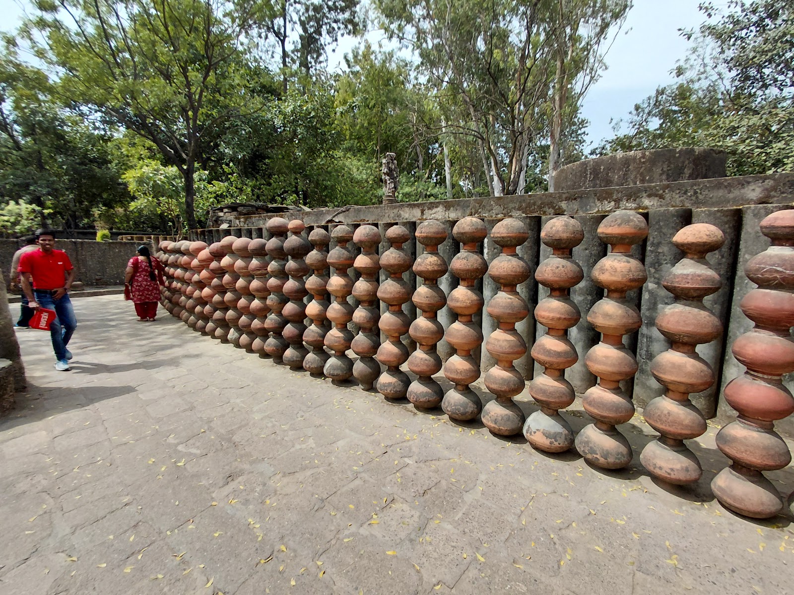 अ