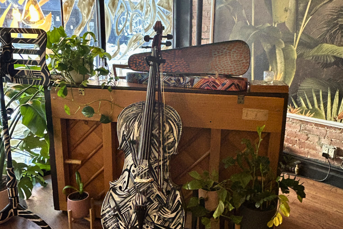 Painted cello and piano at No More Cafe, art-filled East Village space