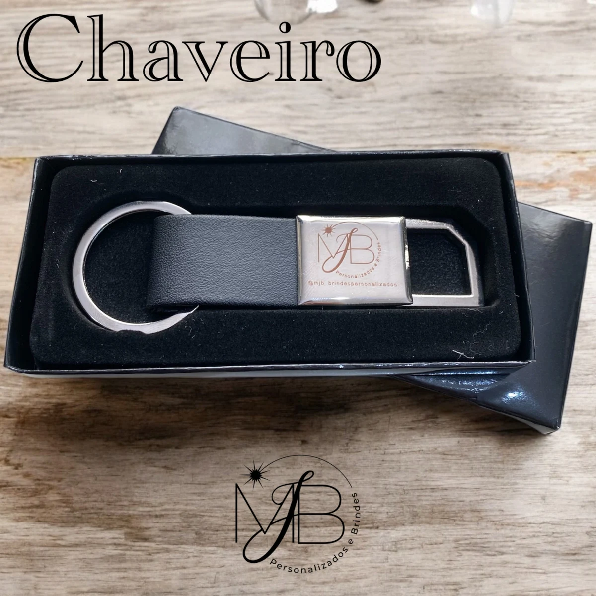 Chaveiro de metal com couro — foto 1