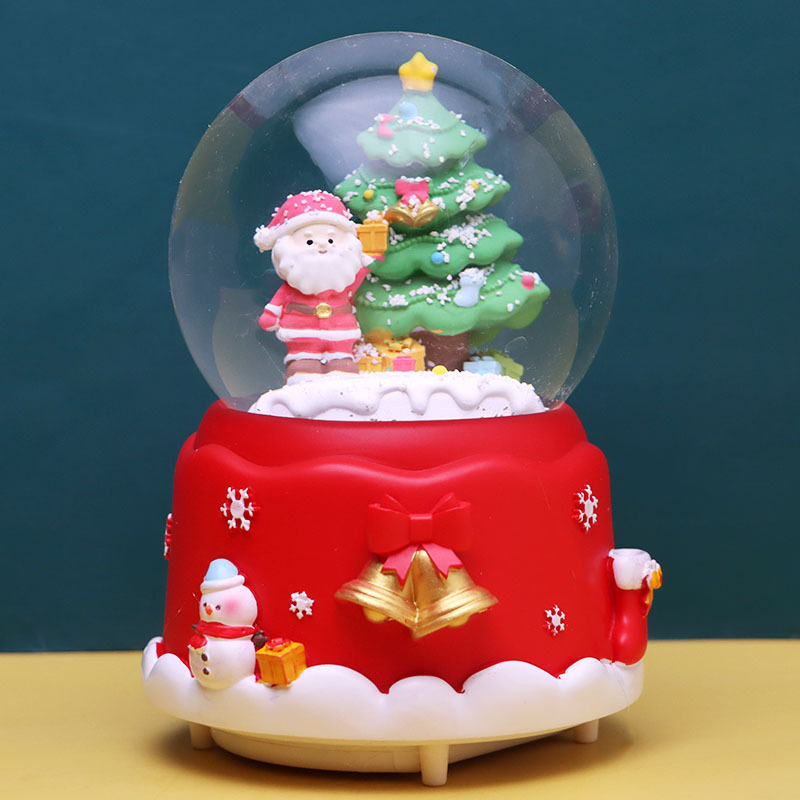 Weihnachtliche Schneekugel mit Musik und Licht