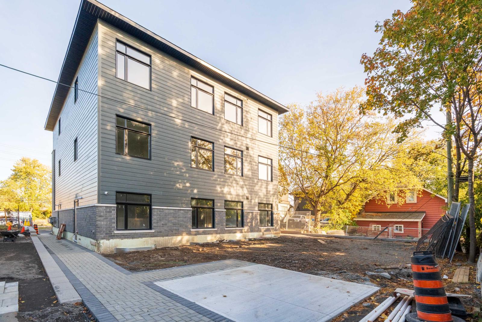 Side of a new multi-unit building in Castle Heights, Ottawa