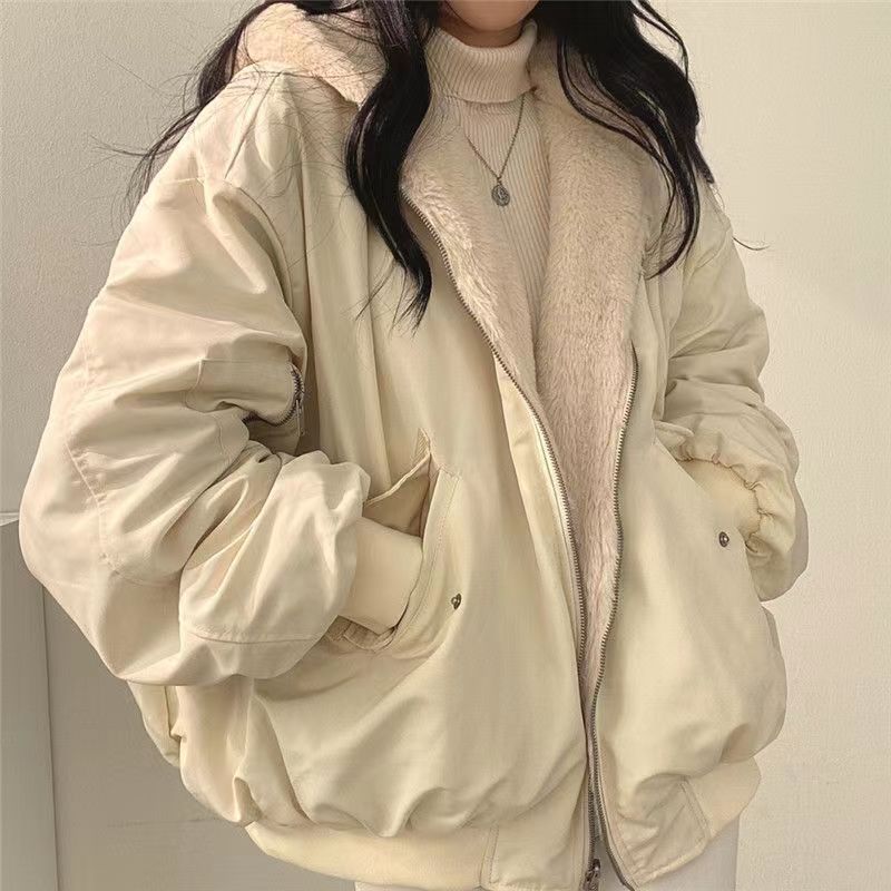 Reversible quilted jacket with lamb fleece lining