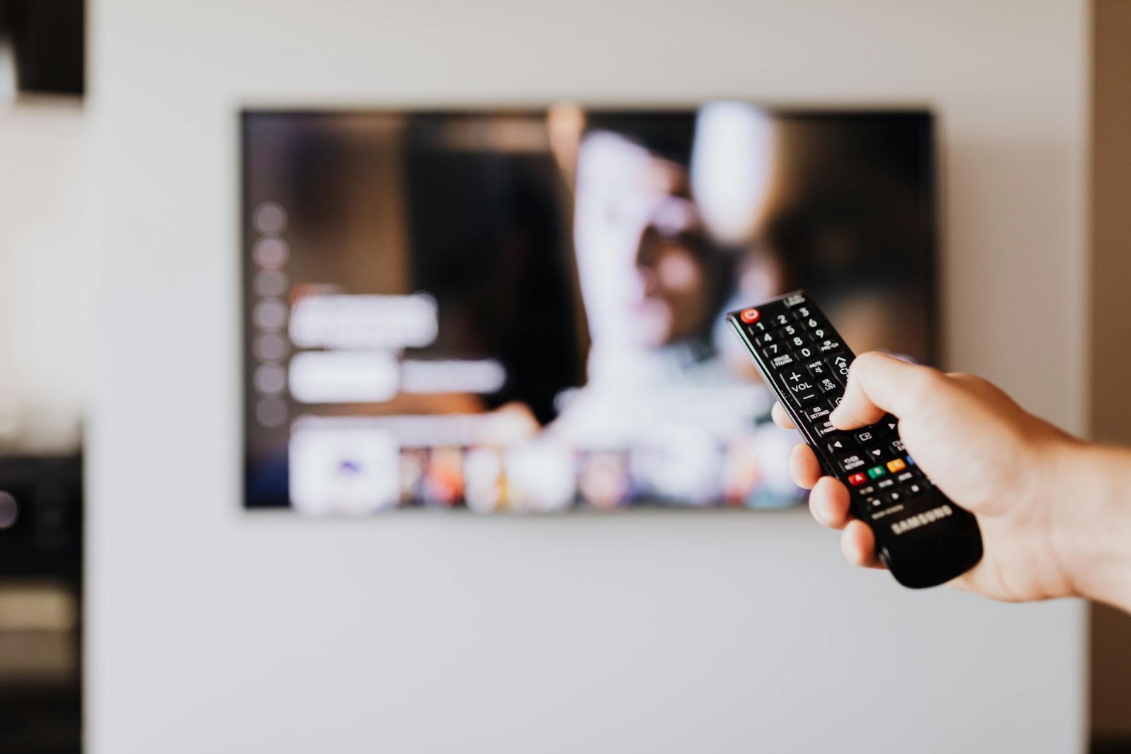 A person effortlessly controlling a comprehensive smart home automation system via a central hub display.