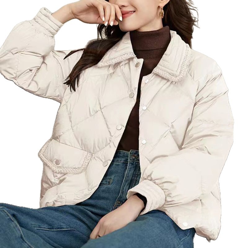 Short women's quilted jacket in a diamond design