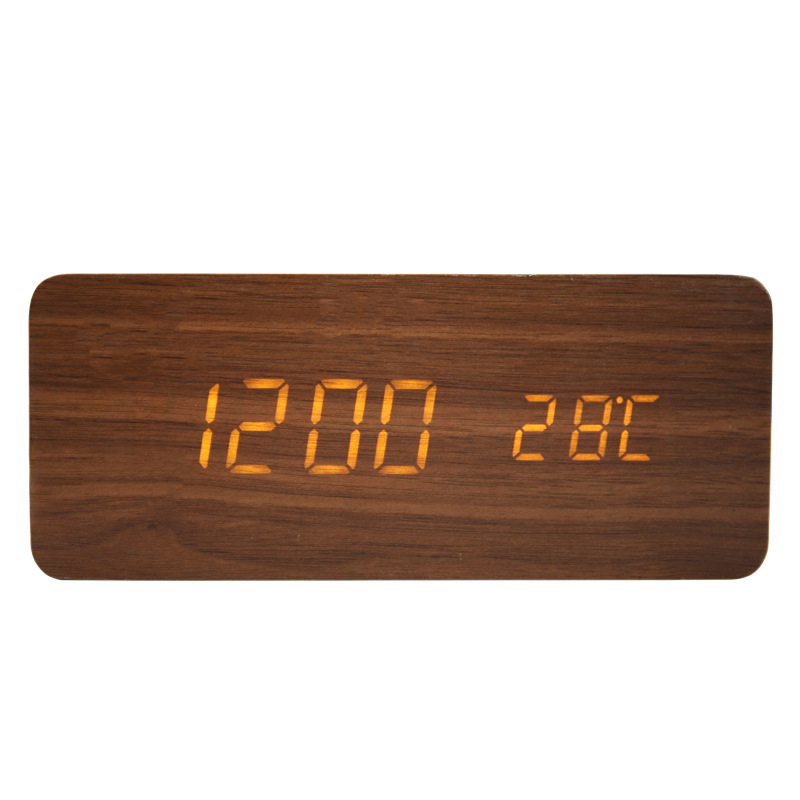Wooden digital clock with wireless charging function for smartphones
