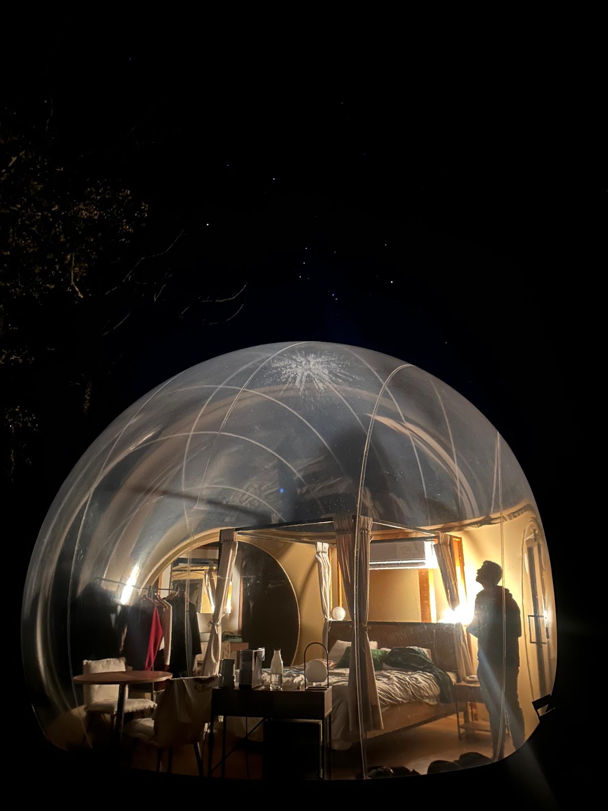 Transparent bubble rooms under the Cortegana night