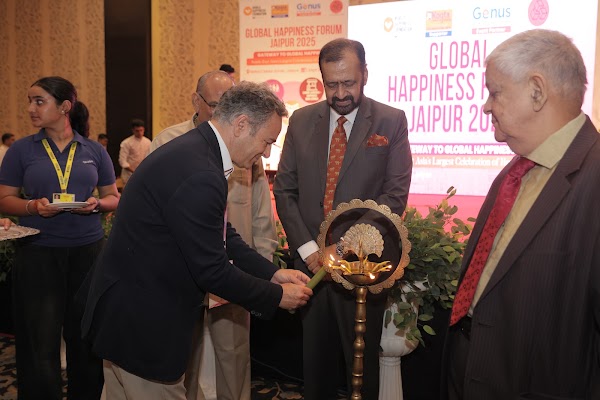 Dignitaries lighting the ceremonial lamp