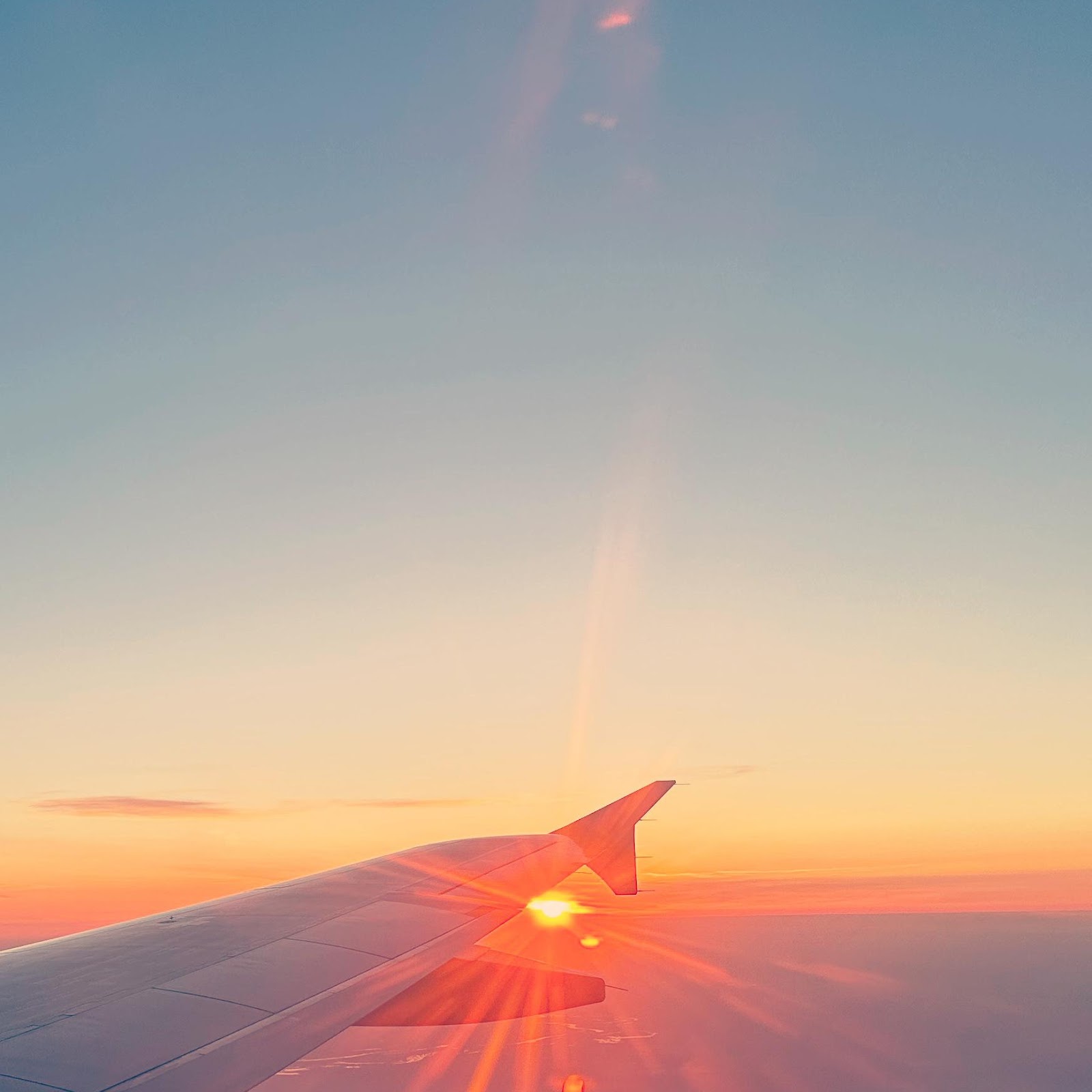 Download Golden Sunset Over Cloudscape 2K iPhone