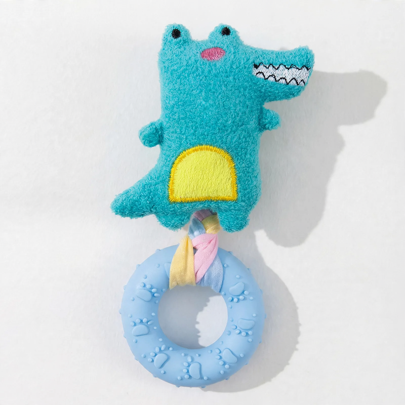 Dog toy with squeaker and dental care