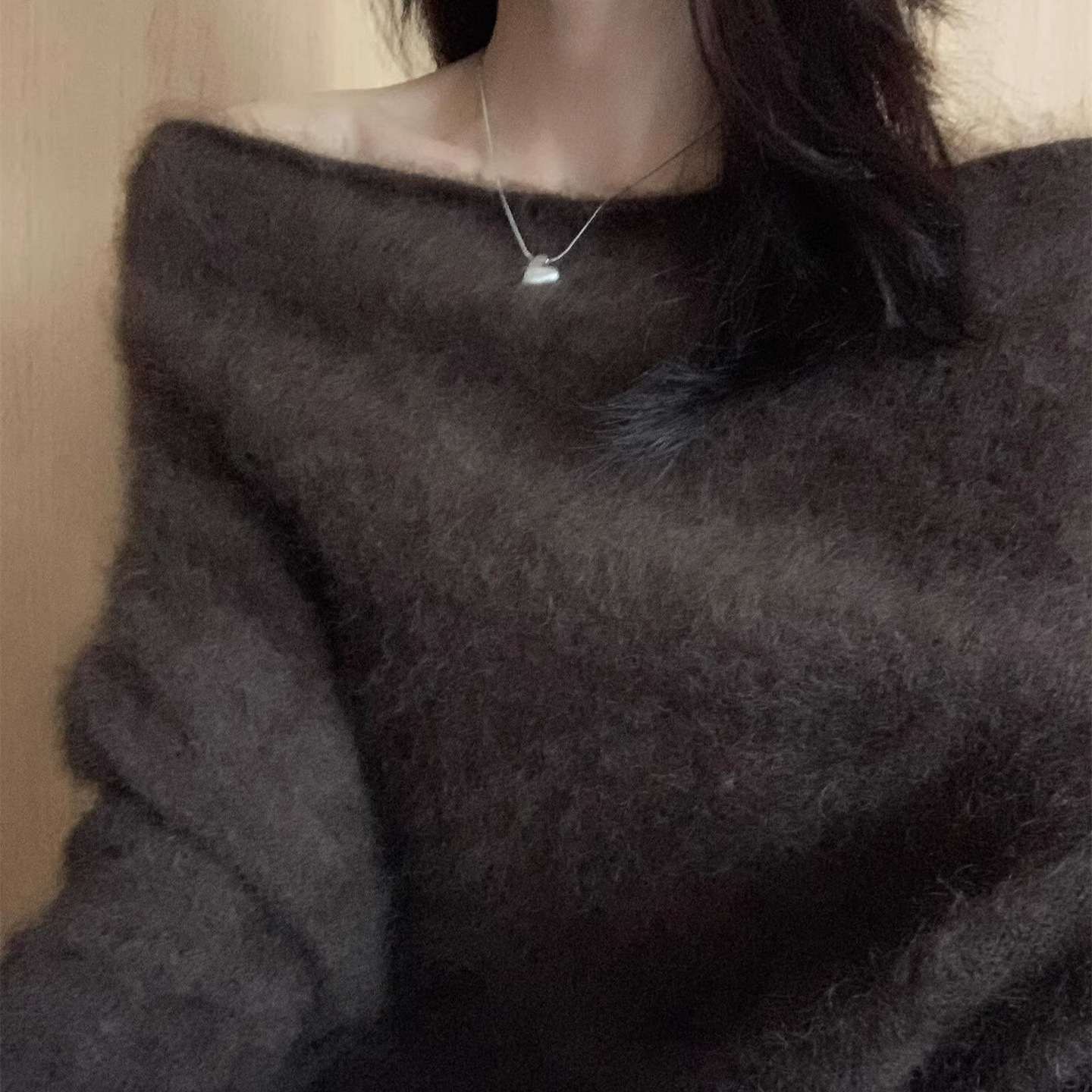 Women's knitted sweater with boat neckline, loose