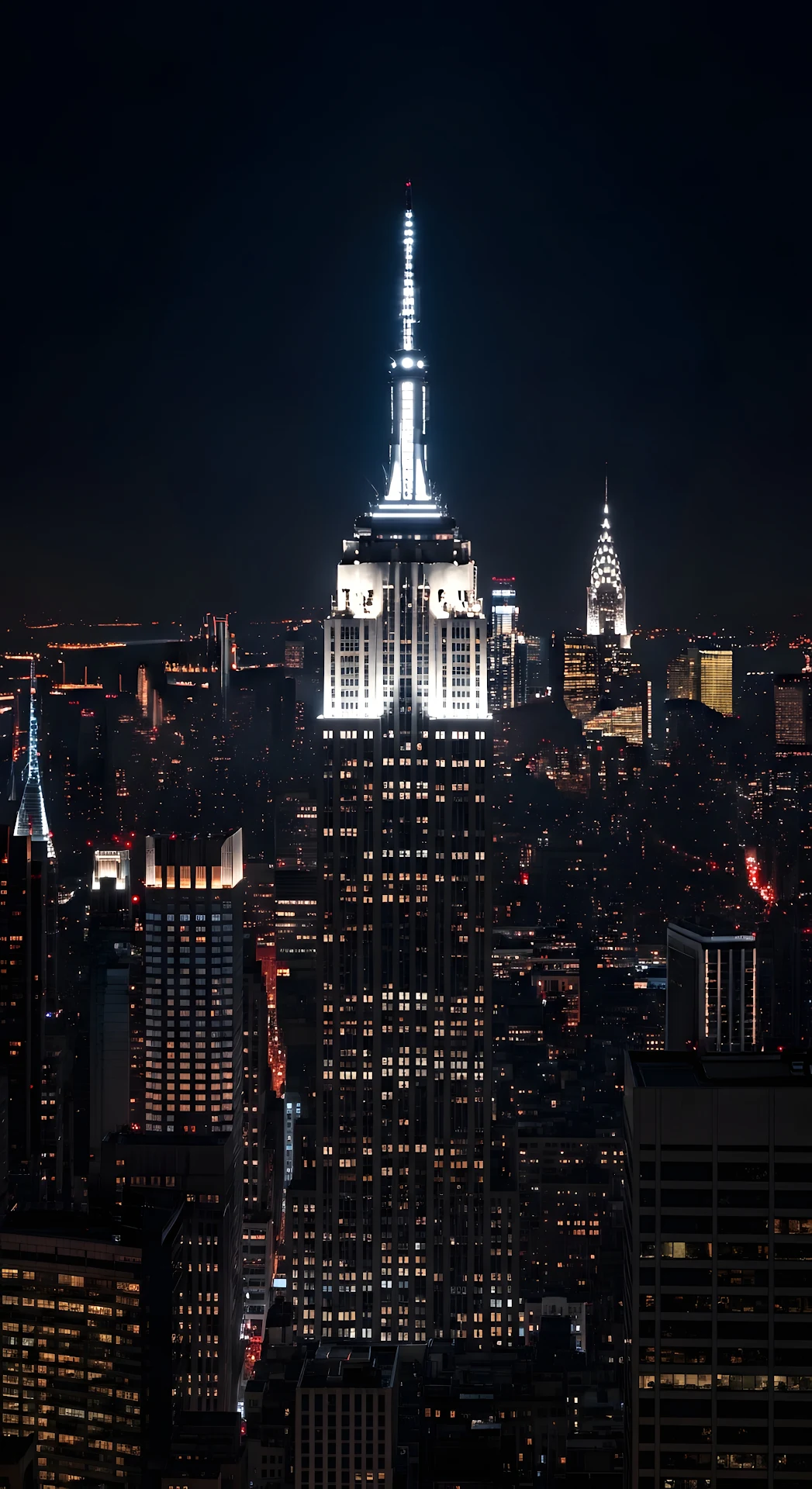 Empire State Building and Manhattan Skyline at Deep Night - Free 4K mobile Wallpaper
