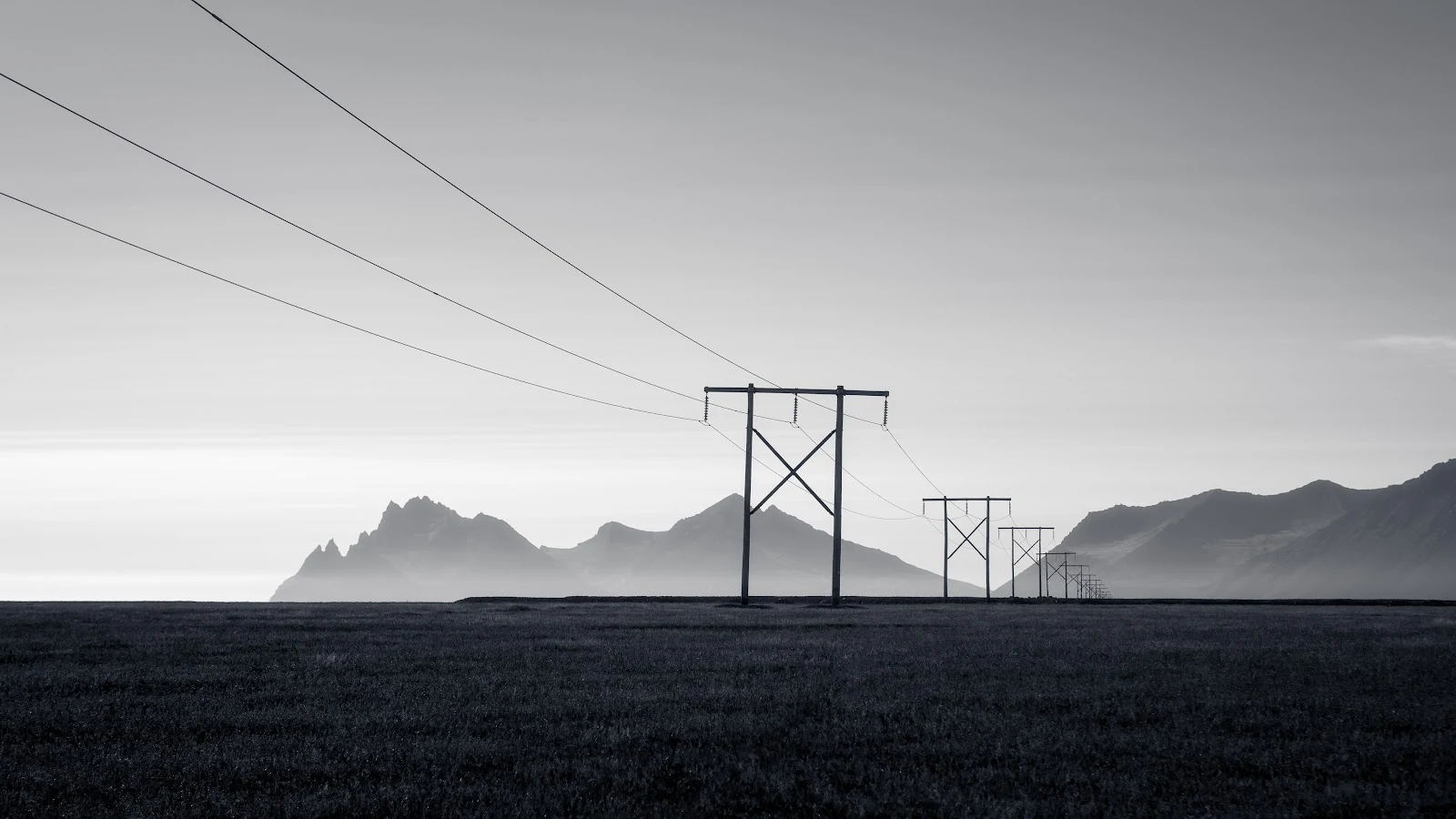 Rows Of Utility Poles And Mountains - Monochrome Landscape Photography 5K Wallpaper (5120x2880)