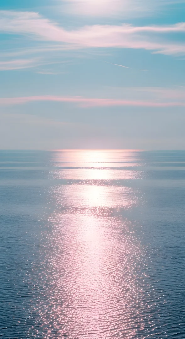Pastel Pink Sun Glare on Calm Ocean Water at Sunset