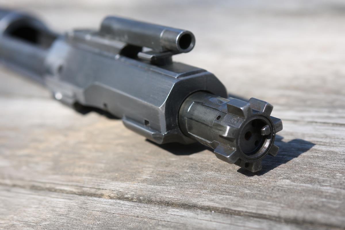 Carpenter 158 mil-spec bolt steel AR-15 locking lugs close-up