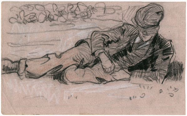 In het gras liggende man