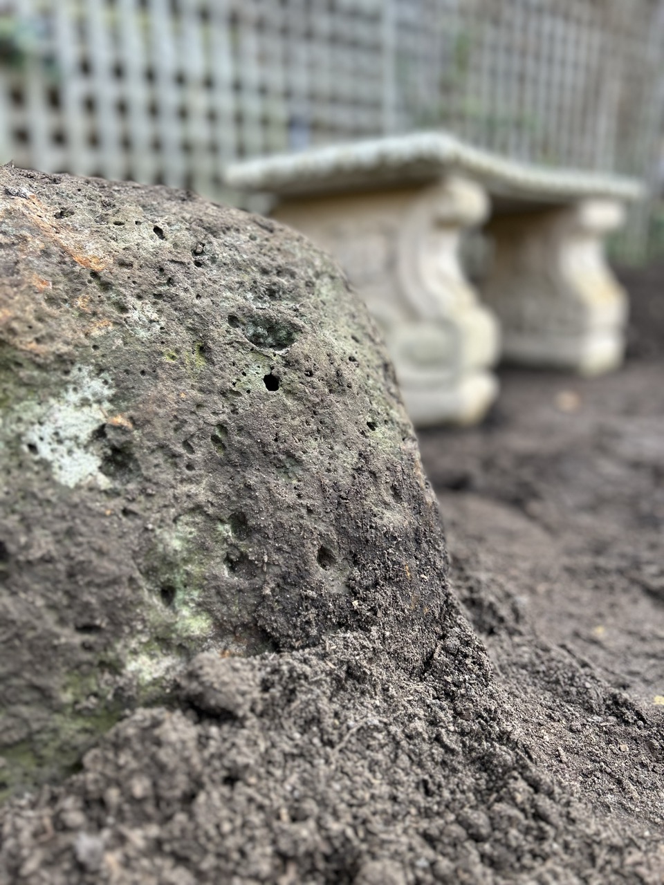 Igneous rock and concrete chair installation