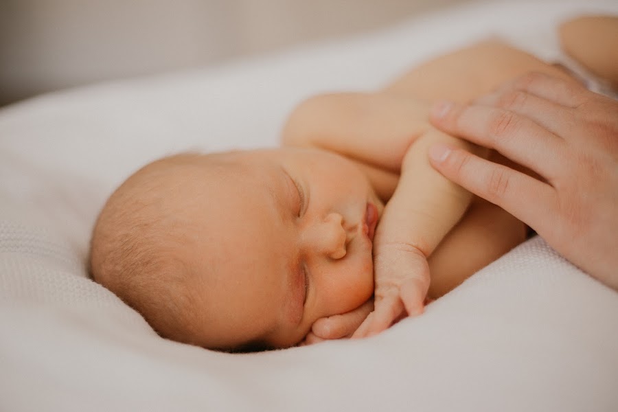 Sleeping newborn in soft window light — Connecticut newborn photographer