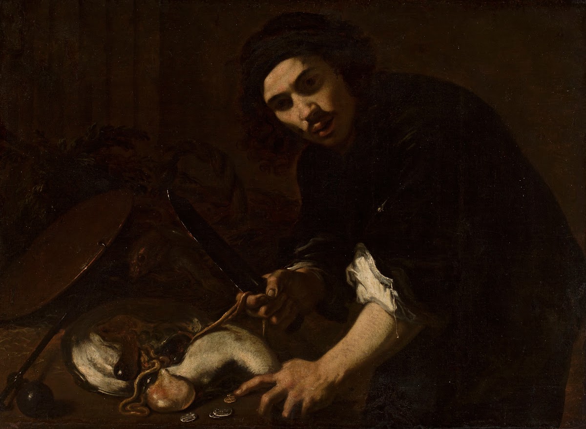 Man gutting a fish