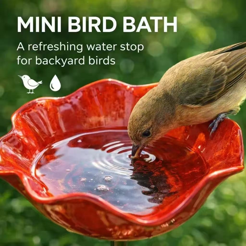 Decorative metal birdbath with ground spike