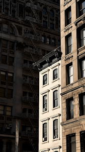 Dramatic City Architecture Facades Fire Escape New York Style