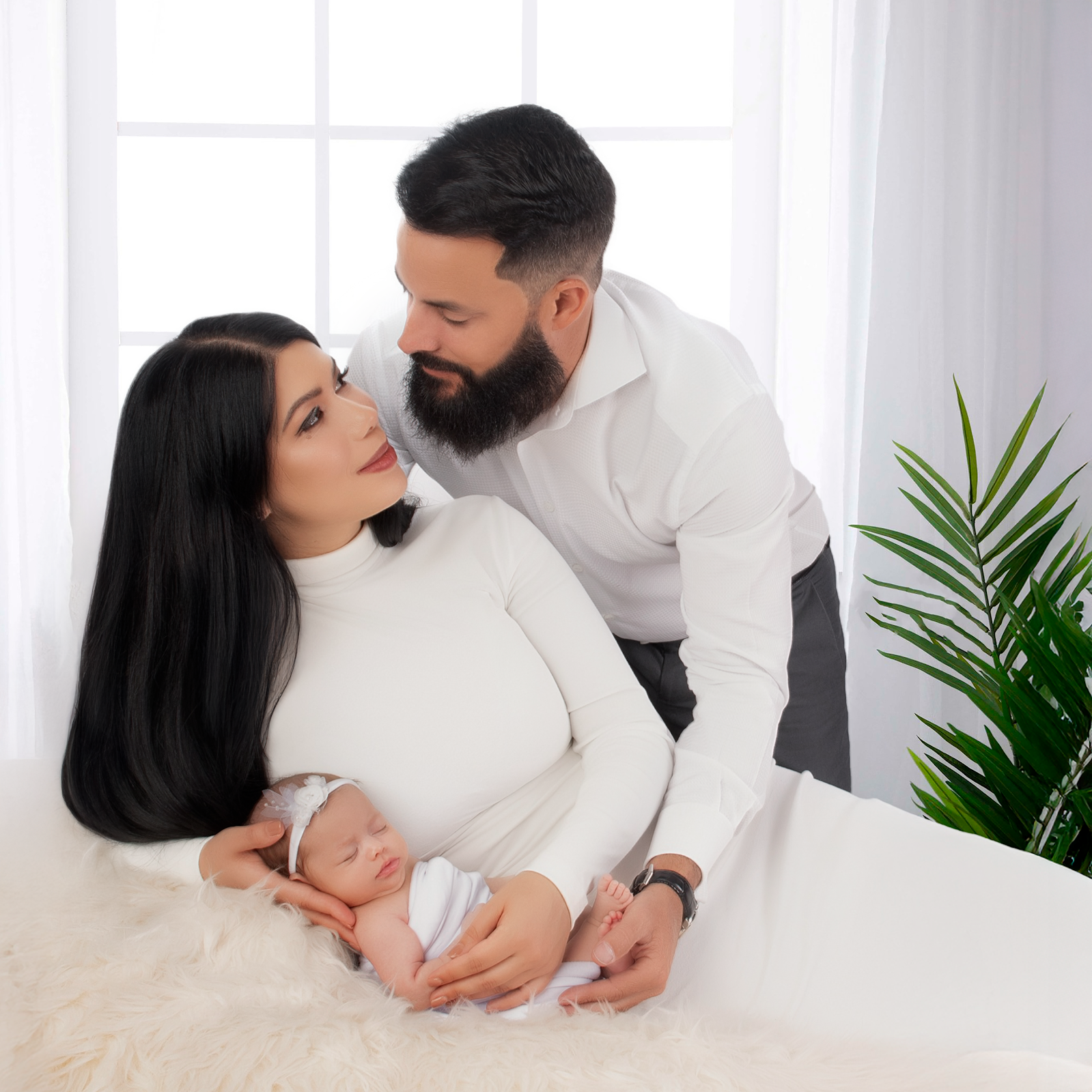 Family with newborn at home