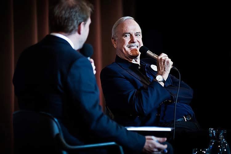 John Cleese sharing a laugh with Oscar Hillerstrom at Popcorn Taxi