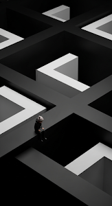 Abstract 3D Geometric Art of a Small Figure Lost in a Labyrinth of Black Shapes
