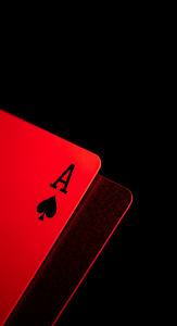 Extreme Macro Minimalist View of an Ace of Spades Playing Card in Red