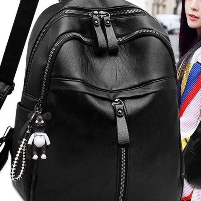 Double-shoulder backpack with a soft faux leather look