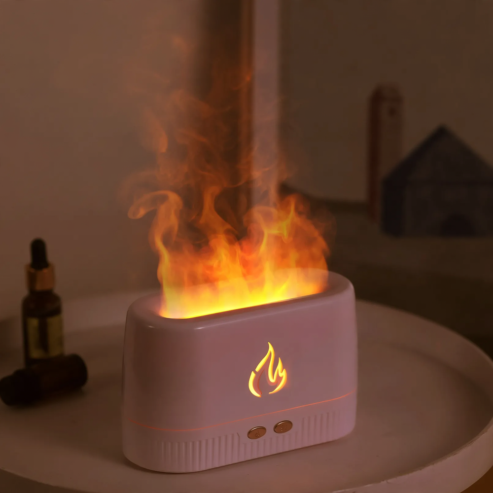 Aroma diffuser with flame effect and humidifier