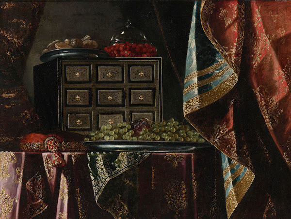 STILL LIFE OF A CHEST FRUIT AND OTHER OBJECTS ON A BROCADE DRAPED TABLE
