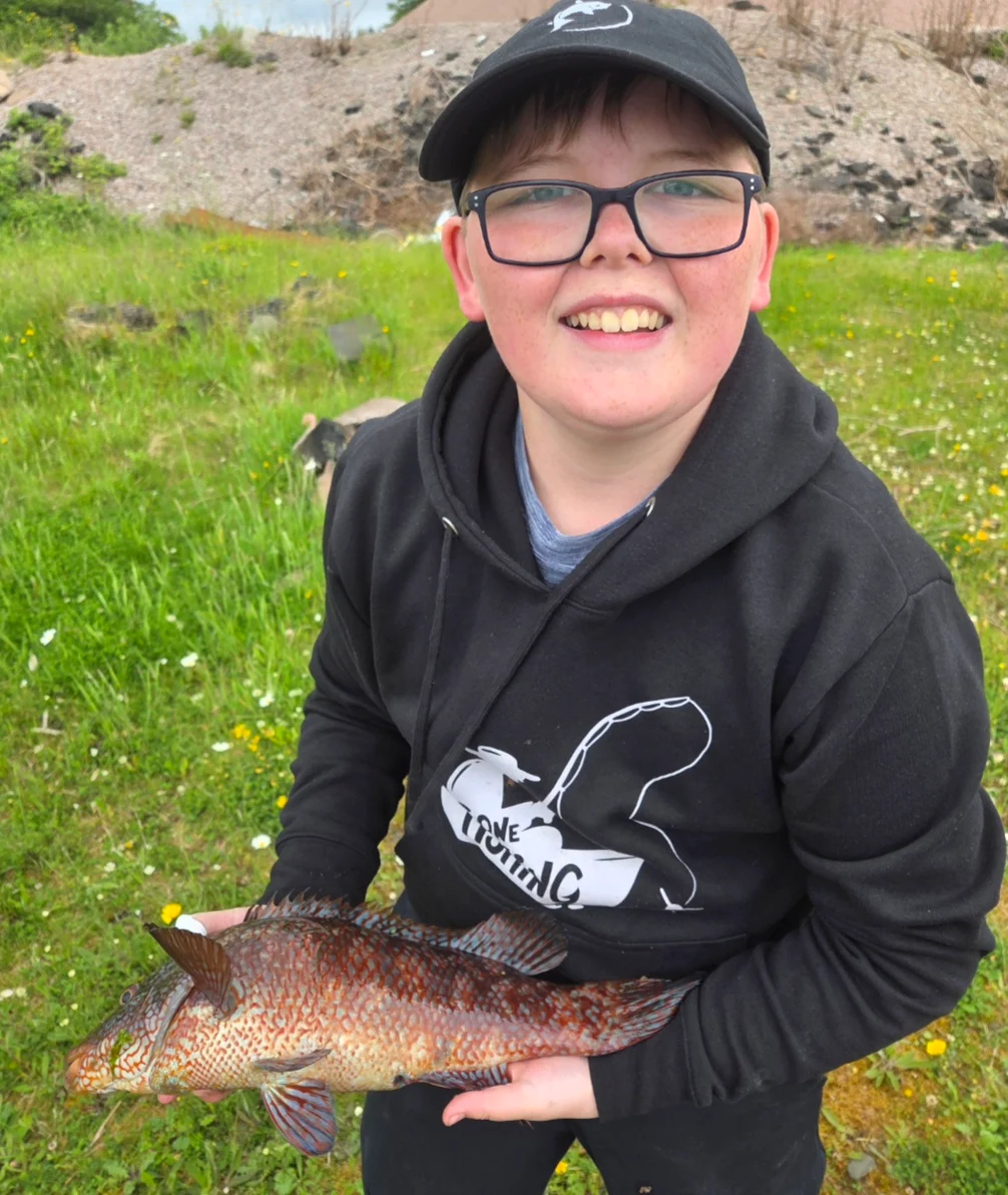 Harry Griffen with a Ballan Wrasse caught on ragworm at Loch Fyne