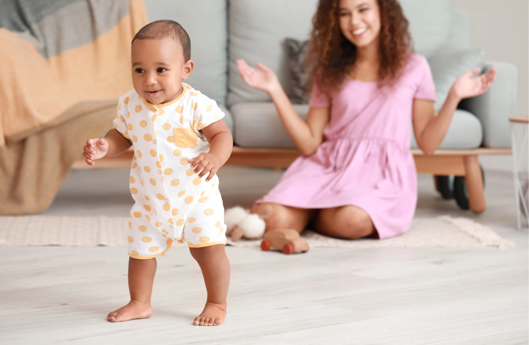 Parent and baby playing together — confident and connected at 9–12 months